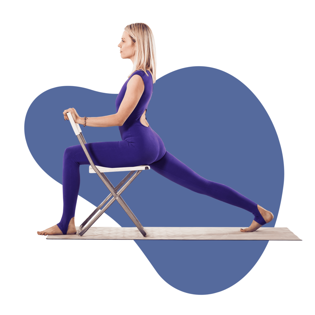 Woman in a variation of the "Virabhadrasana" Yoga Asana, during "Chair Yoga" practice